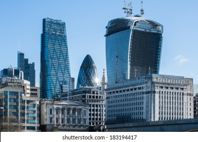 Skyscrapers of The City in London at sunrise in 2014. Buildings include 122 Leadenhall Street (aka the Cheesegrater), 30 St Mary Axe (aka The Gerkin) and 20 Fenchurch Street (aka The Walkie-Talkie)