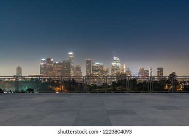 Skyscrapers Cityscape Downtown, Los Angeles Skyline Buildings. Beautiful Real Estate. Night time. Empty rooftop View. Success concept. - Powered by Shutterstock