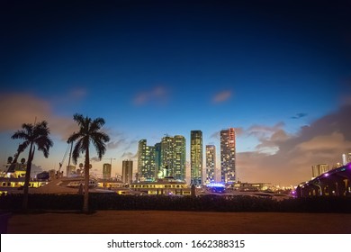 Skyscrapers in downtown Miami and MacArthur causeway at night. Florida, USA - Shutterstock ID 1662388315