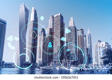 Skyscrapers of Dubai business downtown. International hub of trading and financial services. Technology theme icons hologram, Fintech concept. Double exposure. Dubai Canal waterfront.