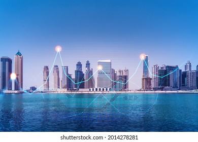 Skyscrapers Of Dubai Business Downtown. International Hub Of Trading And Financial Services Of Western Asia. FOREX Graph And Chart Concept. Double Exposure. Dubai Canal Waterfront.