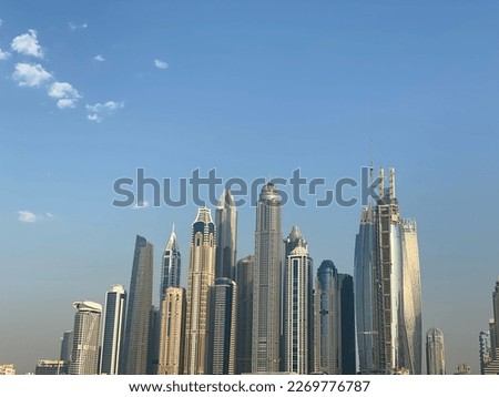 Skyscrapers of dubai marina , modern towers makes modern landmarks and horizonal landscape view. Construction of middleeast buildings
