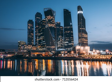 Skyscrapers Of Moscow City Business Center And Moscow River In Moscow At Night, Russia.  Architecture And Landmark Of Moscow