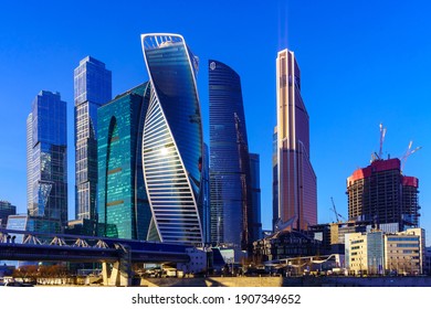 Skyscrapers Of The Moscow City International Business Center Reflecting The Sun On A Cold Winter Day Against The Blue Sky. December 12, 2020