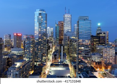 Skyscrapers and office buildings in downtown Toronto financial district at dusk