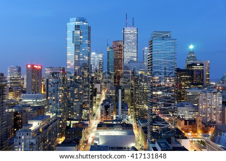 Skyscrapers and office buildings in downtown Toronto financial district at dusk