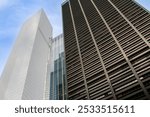 Skyscrapers photographed from low angle in the financial district of New York, USA. One Liberty Plaza skyscraper and to its left Four World Trade Center in lower Manhattan. 2019.