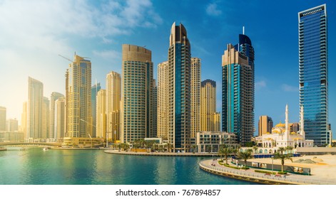 Skyscrapers and yachts in Dubai Marina, United Arab Emirates - Shutterstock ID 767894857
