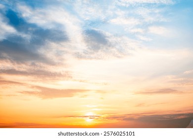 Sky,sunset, beautiful , luxury soft gradient orange gold clouds and sunlight on the blue sky perfect for the background, Sunrise on morning or everning in winter warm time ,Twilight summer,silhouette