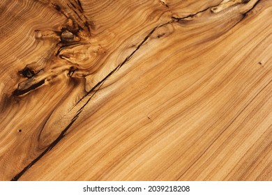 Slab, saw cut wood treated with varnish close-up on a black background. Isolate. Luxury wood for countertops and tables.. Design materials, stylish details for presentation and shop. Concept.
