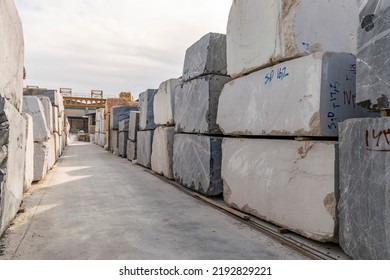 Slab and Stone Manufacturer site, Natural Stone Factory, Raw Massive Cubes of Extracted Natural Marble and Granite