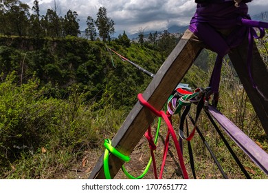 slackline between two trees in a large gorge near the Guapulo neighborhood