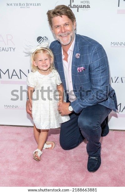 Slade Smiley and\
daughter Skylar Gray Smiley attend Manna Kadar Celebrity Pink\
Carpet Celebrating BAZAAR Cover Release 2022 at Hotel Laguna,\
Laguna Beach, CA on August 9,\
2022