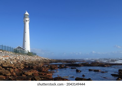 Slangkop Lighthouse During The Day Stark Contrast Of White And Blue