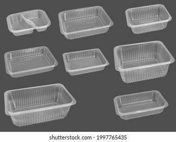 Slanted view different types of transparent trays isolated on grey background - black plastic trays - trays food - rectanguler trays