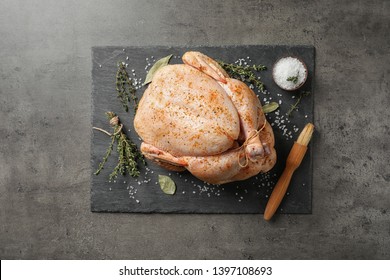 Slate Plate With Raw Spiced Turkey On Grey Background, Top View