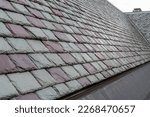 Slate roofing tiles on a historic building.  Attractive, durable roofing material. 