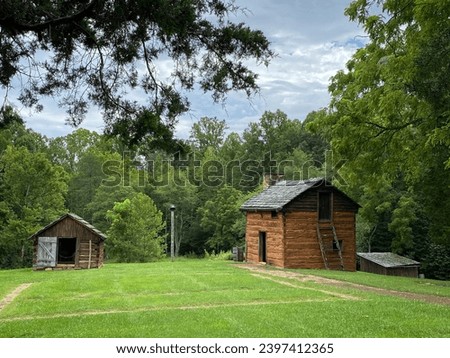 Slave cabin at Booker T. Washington National Monument in rural Virginia. Tobacco farm where educator and leader Booker T. Washington was born into slavery and later freed by Emancipation Proclamation.