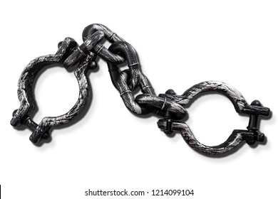 Slavery and bondage concept with strong steel shackles isolated on white background with a clip path cutout