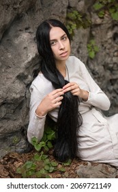 Slavic Girl In A White Linen Dress. Ukrainian Girl In Ethnic Dress. Pagan Girl.