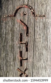 Slavic Pagan Esoteric Symbols (runes) Are Carved On A Tree With Traces Of Burning, With Cracks.