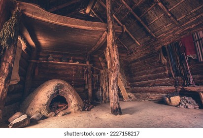 Slavic and Viking village of Wollin. Old wooden and fisherman's hut. Close-up of an old house in the Middle Ages. Old fisherman's hut and wooden hut with spices and pots. evil Dead