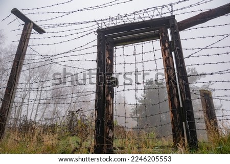 SLAVONICE, CZECH REPUBLIC (CZECHIA) – NOVEMBER 15, 2022: Barbered wire fence as a memorial of the Iron Curtain between West and East in Kadolec (part of Slavonice) near the state border with Austria