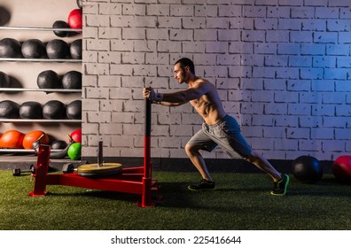 Sled Push Man Pushing Weights Workout Exercise