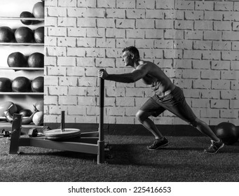 Sled Push Man Pushing Weights Workout Exercise