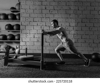 Sled Push Man Pushing Weights Workout Exercise