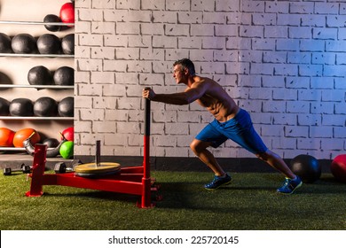 Sled Push Man Pushing Weights Workout Exercise