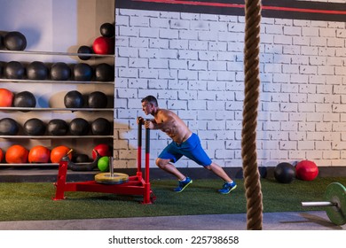 Sled Push Man Pushing Weights Workout Exercise