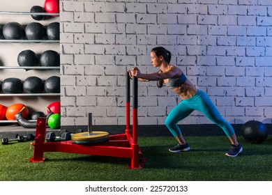 Sled Push Woman Pushing Weights Workout Exercise