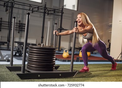 Sled Push Woman Pushing Weights Workout Exercise