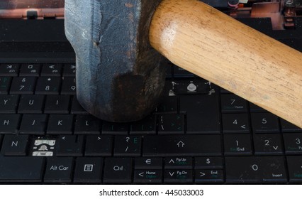 Sledge Hammer Hitting Computer Keyboard