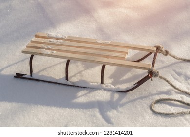 Sledge with rope in snow winter close-up shot. Good background with copy space for winter holidays concept banner. - Shutterstock ID 1231414201