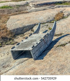 Sleds For Dog Sledding Are On The Rocks On A Sunny Summer Day. Oqaatsut Village, Disko Bay, Greenland