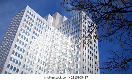 A Sleek Chrome Or Silver Office Building