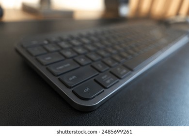 Sleek Logitech wireless keyboard. Low-profile keys for comfortable typing. Modern design with space-saving layout. Perfect for home office or professional workspace. Enhances productivity.