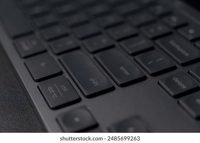 Sleek Logitech wireless keyboard. Low-profile keys for comfortable typing. Modern design with space-saving layout. Perfect for home office or professional workspace. Enhances productivity.