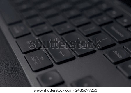Sleek Logitech wireless keyboard. Low-profile keys for comfortable typing. Modern design with space-saving layout. Perfect for home office or professional workspace. Enhances productivity.