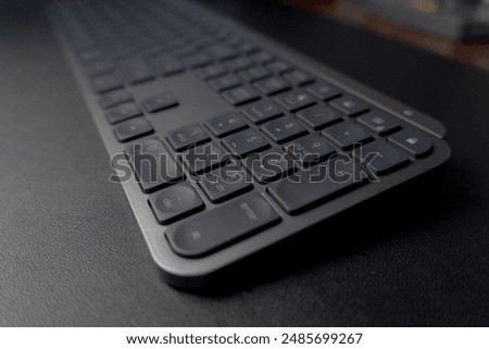 Sleek Logitech wireless keyboard. Low-profile keys for comfortable typing. Modern design with space-saving layout. Perfect for home office or professional workspace. Enhances productivity.