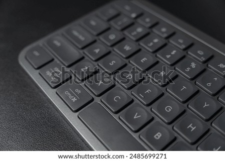 Sleek Logitech wireless keyboard. Low-profile keys for comfortable typing. Modern design with space-saving layout. Perfect for home office or professional workspace. Enhances productivity.