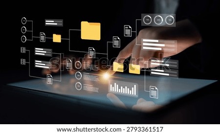 A sleek, modern user interface showcasing digital data visualization elements, with a human hand interacting with a touchscreen tablet in a darkened space. A blend of technology and design. Gantry