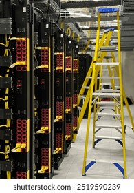 A sleek rack server setup, housing powerful computing units with flashing LEDs. The servers are connected via a network of cables, optimized for data storage and processing in a data center.