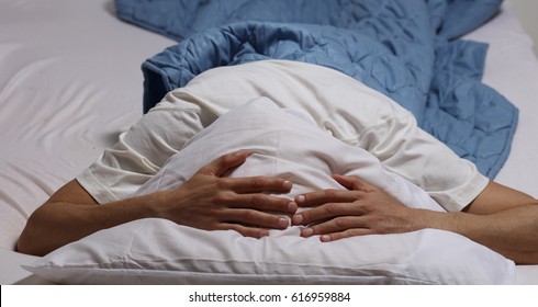 Sleep Disorders and Problems. Man struggling with insomnia. - Powered by Shutterstock