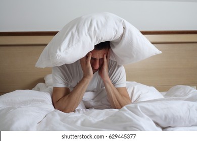 Sleep Disorders And Problems. Man Struggling With Insomnia.