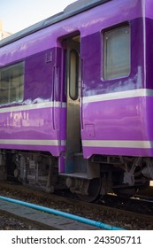 Sleeper class train car on train station