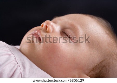 Similar – Newborn baby girl sleeping on blue sheets at home