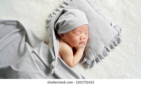 Sleeping Baby On Pillow With Blanket